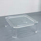 a clear glass coffee table on a gray floor in Portland Oregon